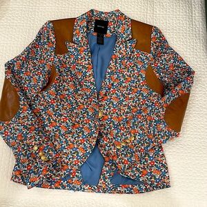 The cutest jacket ever. Smythe runs a little on the smaller side, size 10